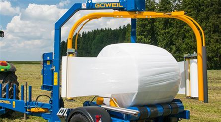 G5012 GÖWEIL Trailed round bale wrapper with twin wrapping arms